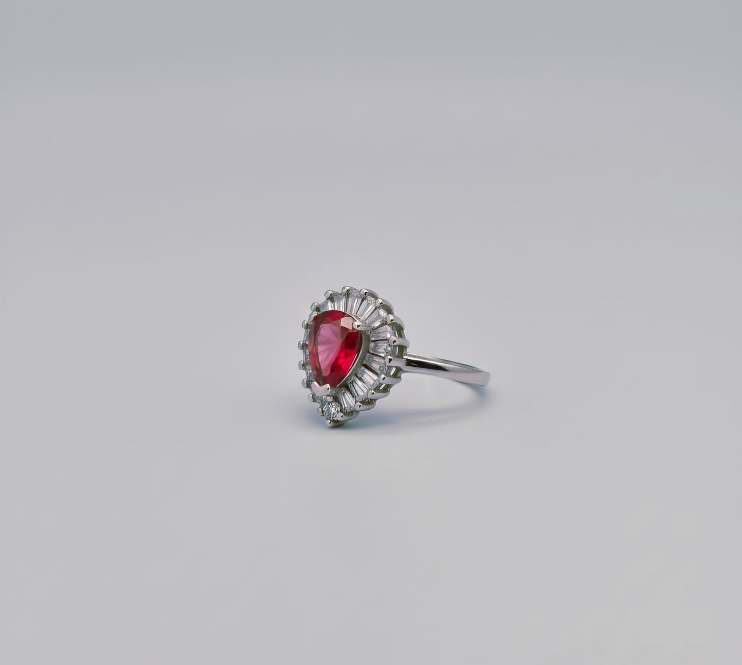 “Royal Flame Halo Ring" – Pear-Cut Red Gemstone & Baguette Crown by Illuzion Jewelry