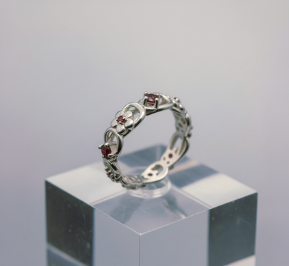 “Crimson Bloom Vintage Eternity Ring" – Floral Red Gemstone Band by Illuzion Jewelry