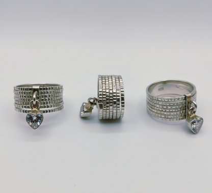 “Silver Heart Charm Statement Band" – Modern Sparkle Ring by Illuzion Jewelry