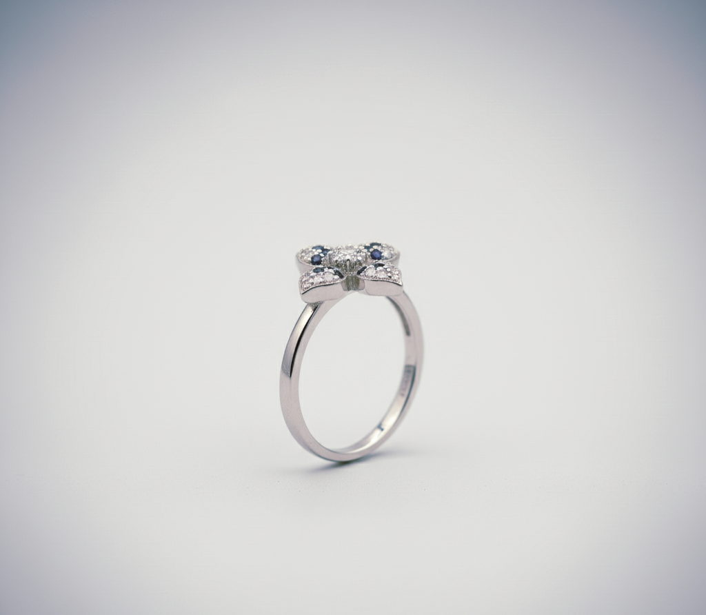 "Midnight Bloom Radiance Ring" – Dual-Tone Starflower in 925 Silver