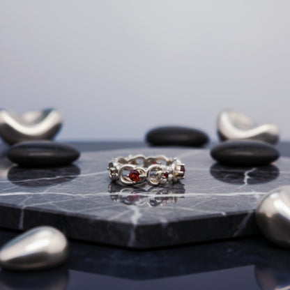 “Crimson Bloom Vintage Eternity Ring" – Floral Red Gemstone Band by Illuzion Jewelry