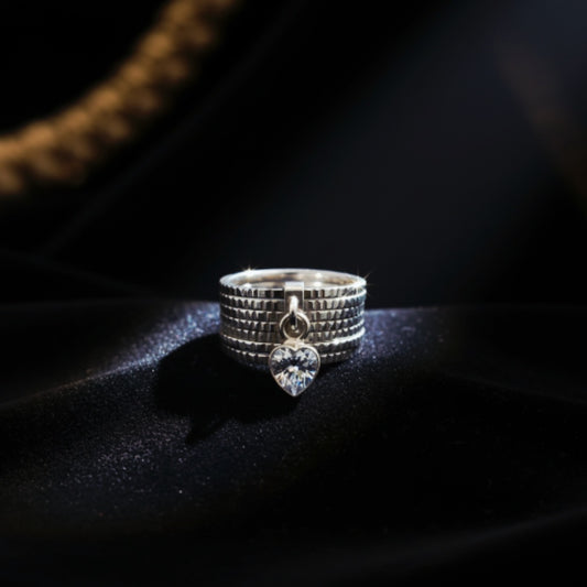 “Silver Heart Charm Statement Band" – Modern Sparkle Ring by Illuzion Jewelry