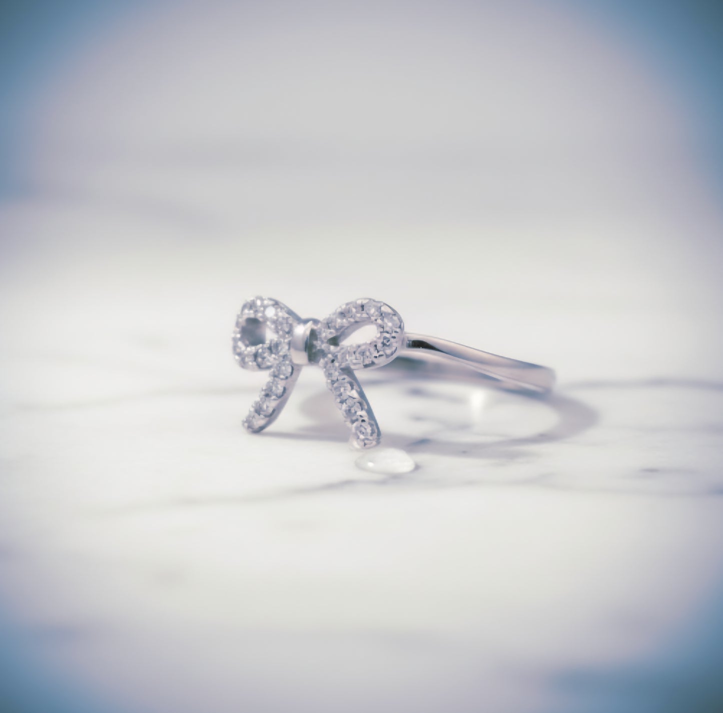 "Whisper-Tied Pavé Ribbon Ring" – Graceful 925 Silver Sparkle