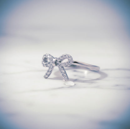 "Whisper-Tied Pavé Ribbon Ring" – Graceful 925 Silver Sparkle