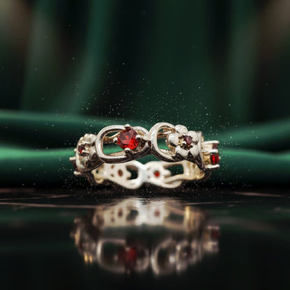 “Crimson Bloom Vintage Eternity Ring" – Floral Red Gemstone Band by Illuzion Jewelry