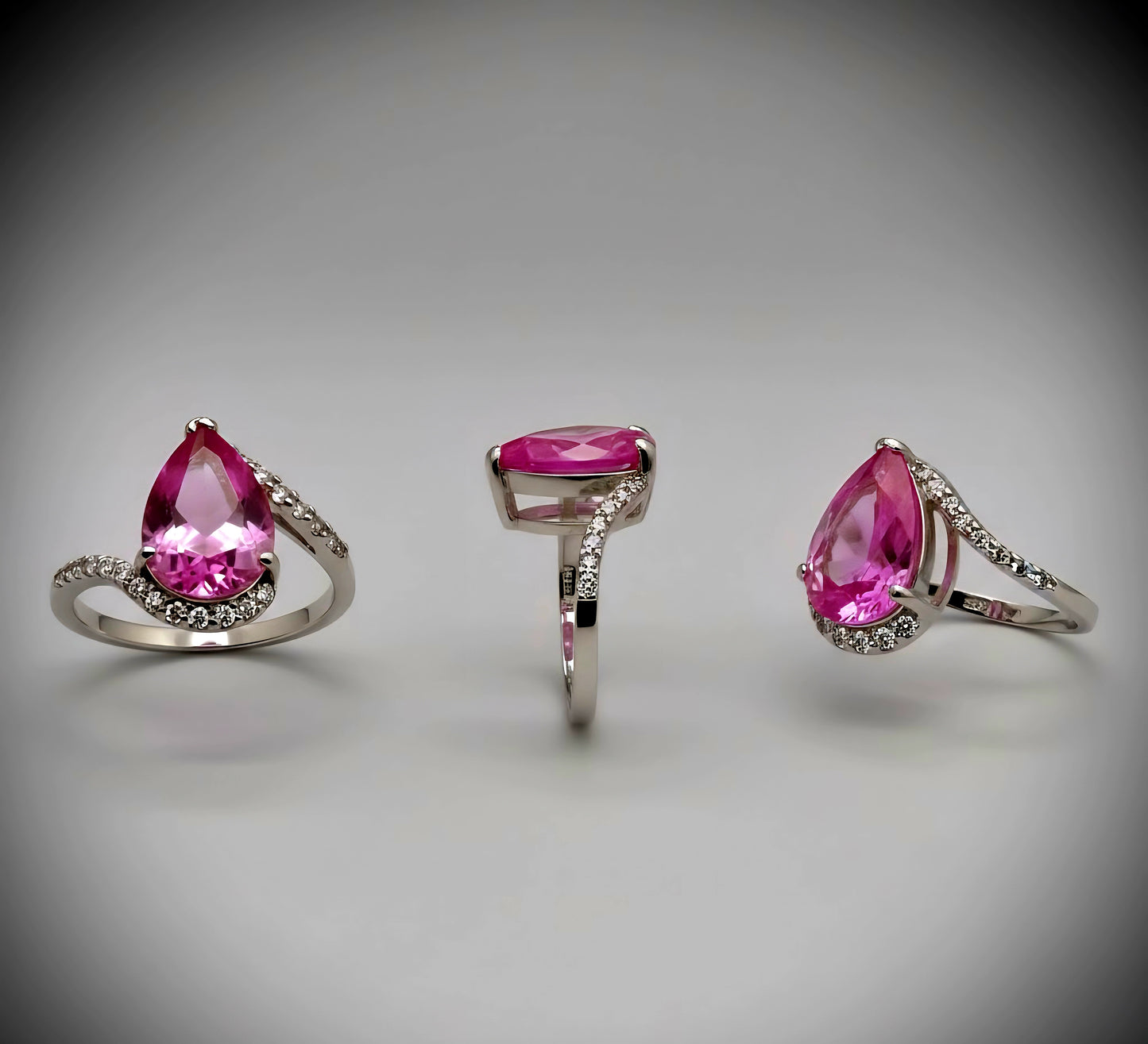 “Pear-Cut Pink Radiance Ring" – 925 Silver & Brilliant CZ Wrap Design