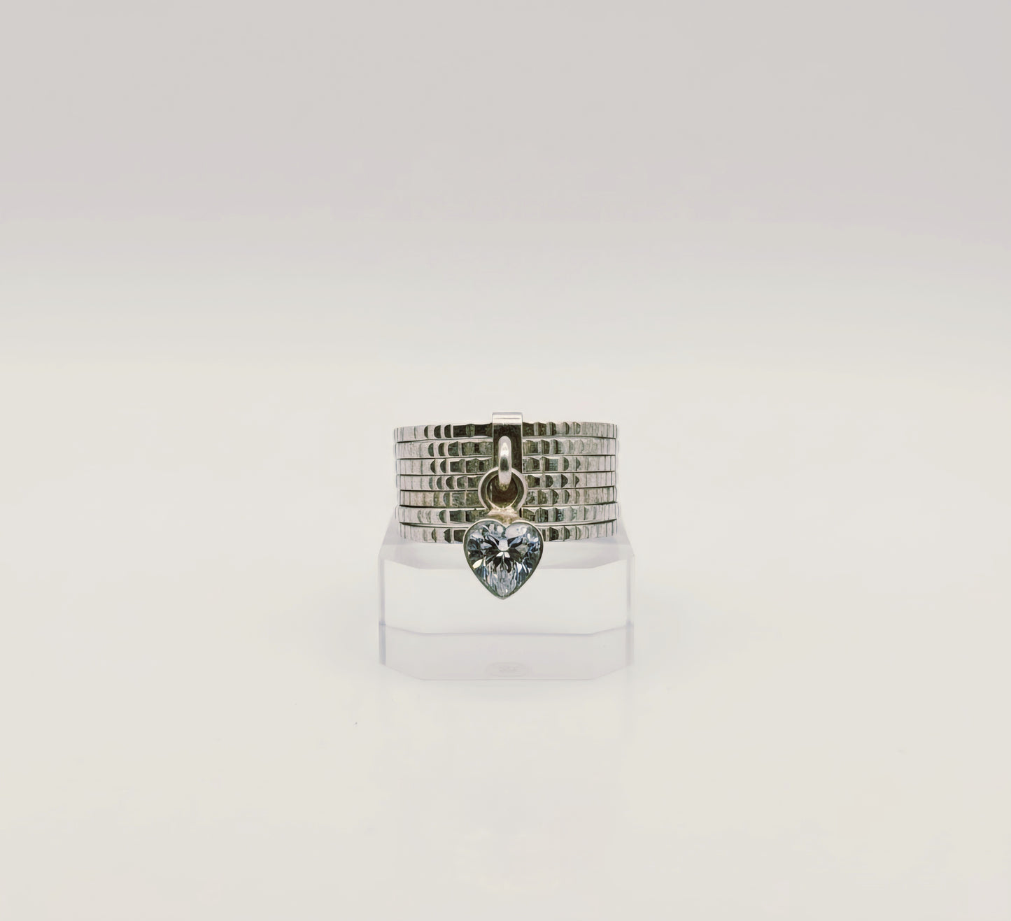 “Silver Heart Charm Statement Band" – Modern Sparkle Ring by Illuzion Jewelry