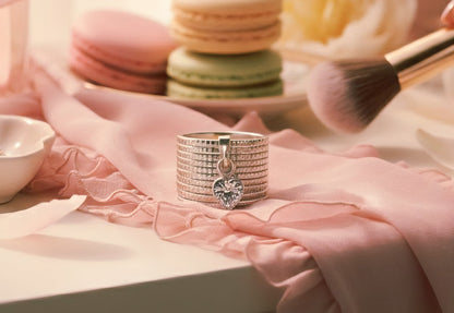 “Silver Heart Charm Statement Band" – Modern Sparkle Ring by Illuzion Jewelry